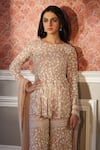 Astha Narang_Peach Net Embroidery Floral Round Peplum Kurta And Sharara Set _Online_at_Aza_Fashions