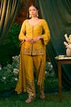 Buy_Astha Narang_Yellow Raw Silk Embroidered Sequin Round Short Kurta Pant Set _at_Aza_Fashions