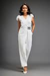 Buy_Deepika Arora_White Ponte Roma Embellished Leather Sphere Short Sleeves Belted Jumpsuit _at_Aza_Fashions