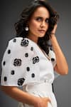 Deepika Arora_White Ponte Roma Embellished Leather Mosaic Blossom Playsuit With Belt _at_Aza_Fashions