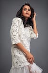 Deepika Arora_White Vegan Leather And Net Cutwork Floral Closed Round Jaal Pattern Dress _at_Aza_Fashions