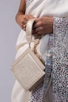 Buy_ADISEE_Ivory Ajrakh Handwoven Textured Wrist Bag _Online_at_Aza_Fashions