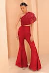 Buy_Label Astha Chhabra_Red Organza Hand Embellished Floral Asymmetric Top With Bellbottom Pant _at_Aza_Fashions