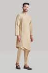 Blue Lotus Design_Beige Cotton Asymmetric Kurta And Pant Set _Online_at_Aza_Fashions