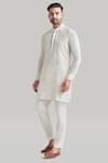 Blue Lotus Design_White Raw Silk Embroidered Thread Plain Buttoned Placket Kurta And Pant Set _Online_at_Aza_Fashions