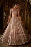 Buy_Seema Gujral_Rose Gold Net Embellished Sequins Asymmetric Neck Lehenga With Blouse _at_Aza_Fashions