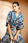 Akanksha Mago_Blue Georgette Print Abstract V Neck Wrapped Top With Sharara _at_Aza_Fashions