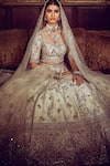 Buy_MATSYA_Ivory Blouse And Lehenga Raw Silk The Masai Landscape Aurum Aged Bridal Set _Online_at_Aza_Fashions