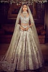 MATSYA_Ivory Blouse And Lehenga Raw Silk The Masai Landscape Aurum Aged Bridal Set _at_Aza_Fashions