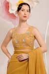 PREETI MEHTA_Yellow Georgette Viscose 60% Embroidered Sequin Pleated Saree With Flora Blouse _at_Aza_Fashions