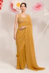 Buy_PREETI MEHTA_Yellow Georgette Viscose 60% Embroidered Sequin Pleated Saree With Flora Blouse _at_Aza_Fashions