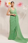 Shop_PREETI MEHTA_Green Georgette Viscose 60% Embroidered Sequin Pleated Saree With Flower Blouse _Online_at_Aza_Fashions