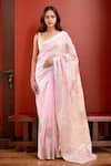 Buy_Samyukta Singhania_Pink Linen Blend Hand Painted Bloom Tassel Bordered Saree With Running Blouse _at_Aza_Fashions