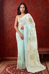 Buy_Samyukta Singhania_Blue Linen Blend Hand Painted Floral Tassel Bordered Saree With Running Blouse _at_Aza_Fashions