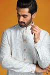 Char Chaand_Ivory Cotton Embroidery Thread Floral Bundi With Kurta _at_Aza_Fashions