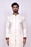 Shop Arihant Rai Sinha Cream Satin, Silk Embroidery Front Zip Detail Kurta With Pant Pyjama Online at Aza Fashions Shop_Arihant Rai Sinha_Cream Satin, Silk Embroidery Front Zip Detail Kurta With Pant Pyjama _Online_at_Aza_Fashions