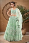 Buy_Samyukta Singhania_Green Net Embroidery Sequin Sweetheart Neck Floral Lehenga Set _at_Aza_Fashions