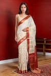 Buy_Samyukta Singhania_White Satin Silk Woven Floral And Zari Pattern Saree With Running Blouse _at_Aza_Fashions