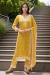 Buy_Samyukta Singhania_Yellow Kurta Dola Silk Hand Work Bead Notched Round Floral Detailed Yoke Set _at_Aza_Fashions