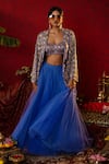 Pooja Bagaria_Blue Natural Linen Embroidered Sequin Solid Lehenga Floral Ajrakh Print Set _at_Aza_Fashions