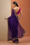 Shop_Esha Koul_Purple Georgette Embroidered Sequin Plunging V Border Saree With Blouse _at_Aza_Fashions