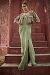 Reynu Taandon_Green Georgette Embroidered Kalamkari Stone Work Draped Corset Saree With Cape _Online_at_Aza_Fashions