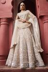 Buy_Reynu Taandon_Ivory Chanderi Embroidered Sequin Plunging Elegant Lehenga Set _at_Aza_Fashions