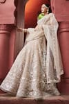 Reynu Taandon_Ivory Chanderi Embroidered Sequin Plunging Elegant Lehenga Set _Online_at_Aza_Fashions