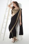 Sunita Nagi_Black Crape Embroidered Floral V Neck Hem Dhoti Skirt Saree With Blouse _at_Aza_Fashions