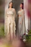 Divisha Sharma_Ivory Silk Organza Embroidery Thread Cutwork Zardozi Jacket Dhoti Skirt Set _at_Aza_Fashions