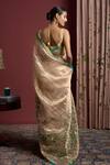 Shop_Akutee_Gold Handwoven Tissue Hand Kaveri Painted Saree With Unstitched Blouse Piece _at_Aza_Fashions