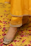 MITHI SUPARI_Yellow Pure Silk Chanderi Embroidered Zardozi Notched Tilla Kurta Set _at_Aza_Fashions