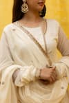 MITHI SUPARI_Ivory Malai Chanderi Embroidered Zardozi Round Gayatri Angrakha Set _at_Aza_Fashions