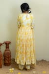 Shop_MITHI SUPARI_Yellow Cambric Cotton Printed Floral Round Anarkali Set _at_Aza_Fashions