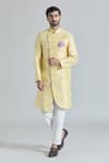 Aryavir Malhotra_Yellow Pure Silk Embroidery Gardenia Bloom Asymmetric Sherwani With Polo Pant _Online_at_Aza_Fashions