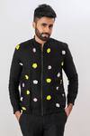 Buy_Vaani Beswal_Black Handwoven Linen Embroidered Floral Applique Bloom Detailed Bomber Jacket _at_Aza_Fashions