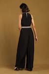 Shop_Ritu Kumar_Black Viscose Crepe Embroidered Thread High Round Elec Yoke Jumpsuit _at_Aza_Fashions