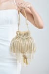 Shop_Samyukta Singhania_Gold Cutdana Mesh Tassel Embellished Potli Bag _at_Aza_Fashions