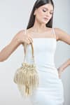 Shop_Samyukta Singhania_Gold Cutdana Mesh Tassel Embellished Potli Bag _Online_at_Aza_Fashions