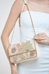 Samyukta Singhania_Cream Beads Sequin Bloom Embroidered Sling Bag _at_Aza_Fashions