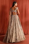 Shop_Adaara Couture_Silver Net Embroidery Jaal Asymmetric Flair Bloom Lehenga Set _at_Aza_Fashions