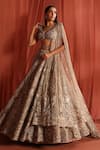 Adaara Couture_Silver Net Embroidery Jaal Asymmetric Flair Bloom Lehenga Set _Online_at_Aza_Fashions