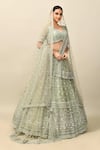 Shop_Kalighata_Green Organza Embroidery Cutdana Leaf Neck Romania Bridal Lehenga Set _Online_at_Aza_Fashions