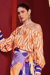 Mandira Wirk_Orange Satin Print Bloom Swerve One Shoulder Neck Top With Ruffled Wrap Skirt _at_Aza_Fashions