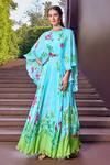 Buy_Mandira Wirk_Blue Chiffon Print Botanic Bloom Ruffled High Neck Cape Sleeves Maxi Dress _at_Aza_Fashions