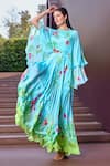 Buy_Mandira Wirk_Blue Chiffon Print Botanic Bloom Ruffled High Neck Cape Sleeves Maxi Dress _Online_at_Aza_Fashions