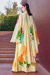 Shop_Mandira Wirk_Beige Chiffon Print Botanic Flora High Neck Cape Sleeves Maxi Dress _at_Aza_Fashions