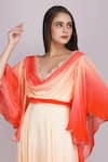 Mandira Wirk_Red Chiffon Ombre Draped Cowl V Neck Flutter Sleeves Gown _at_Aza_Fashions