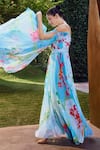 Shop_Mandira Wirk_Blue Poly Georgette Print Garden Bloom Sweetheart Pleated Maxi Dress With Belt _at_Aza_Fashions