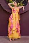 Buy_Mandira Wirk_Yellow Lurex Georgette Print Floral Plunging V Neck Glittery Striped Maxi Dress _at_Aza_Fashions